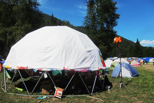 Our geodesic dome, with Tyvek cover rolled partway up, and Tigger totem Our geodesic dome, with Tyvek cover rolled partway up, and Tigger totem